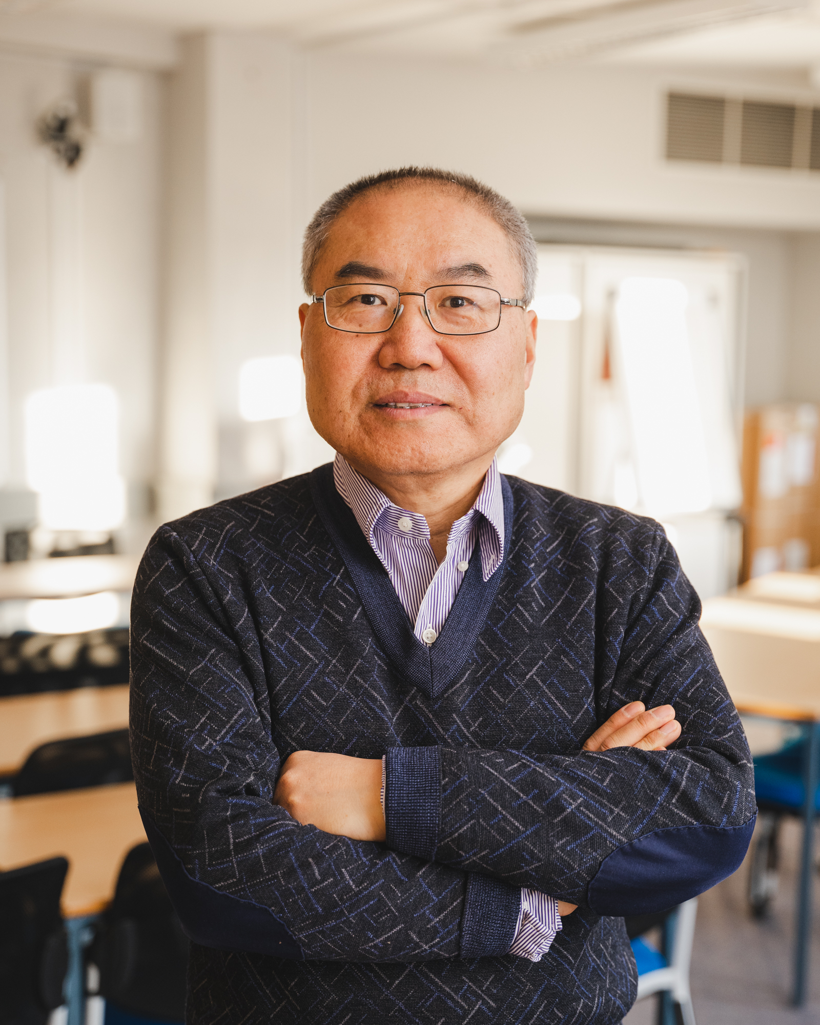 Xing-Gang Yan
